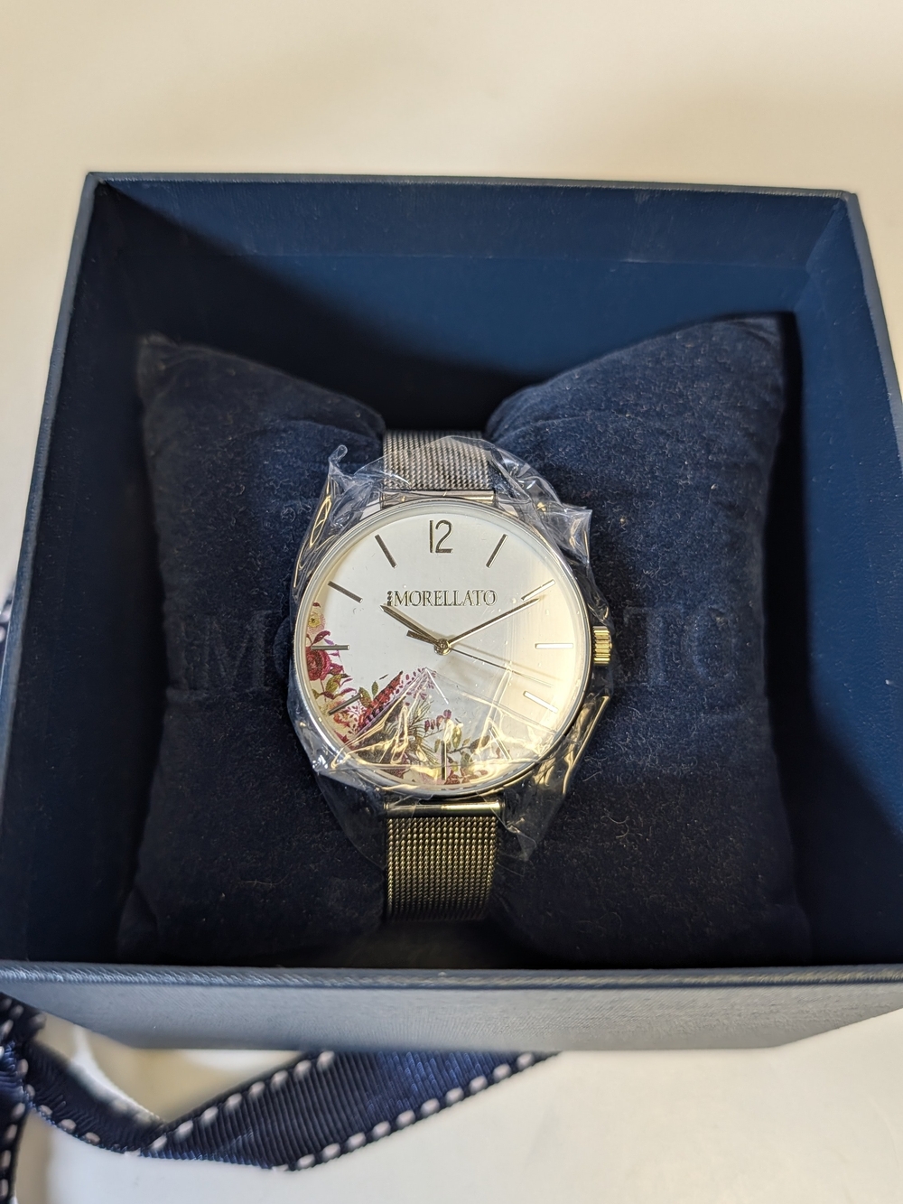 Women’s Silver Mesh Strap Watch with Floral Dial Accent